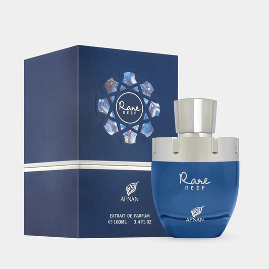 Rare Reef Afnan 100 ML, flacon de parfum bleu avec emballage élégant, extrait de parfum.