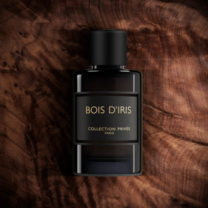 Flacon de parfum Bois d’Iris Geparlys Parfums sur fond en bois homme femme maroc