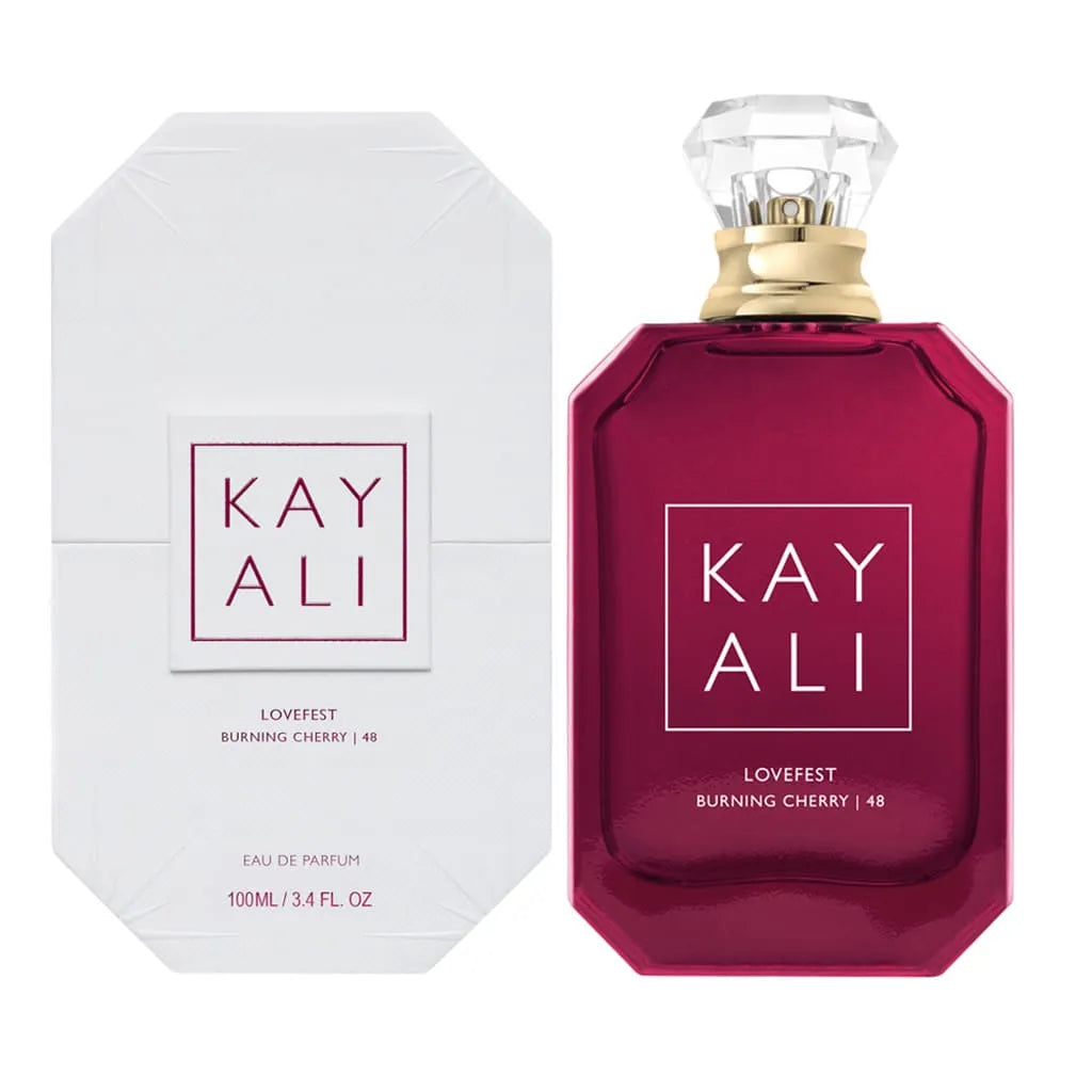 Flacon de parfum Kayali Lovefest Burning Cherry 48 100 ML, avec une élégante bouteille rouge et un emballage blanc.