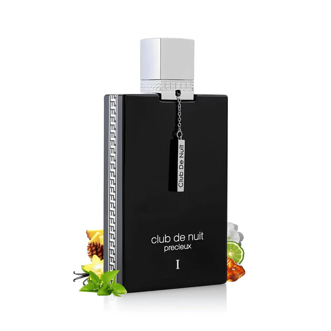 Flacon de parfum Club de Nuit Précieux I Armaf 100 ML entouré d'ingrédients aromatiques.