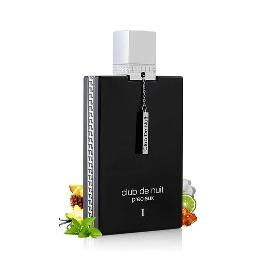 Flacon de parfum Club de Nuit Précieux I Armaf 100 ML entouré d'ingrédients aromatiques.